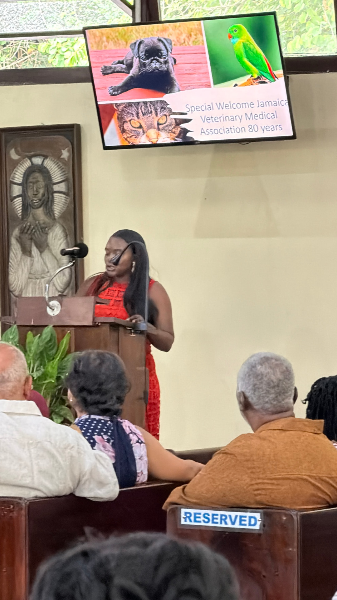 A JVMA representative speaking during the 80th anniversary church service